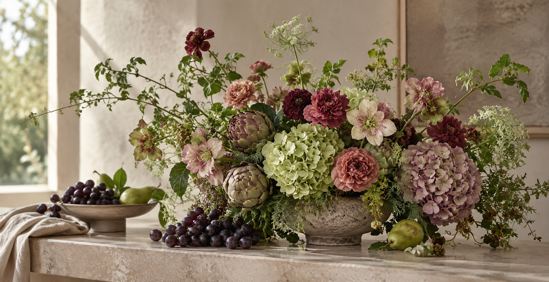 A custom floral arrangement by Fleur & Finch, macro detail of hellebore and ranunculus